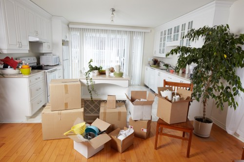 Removal van loading household furniture and boxes