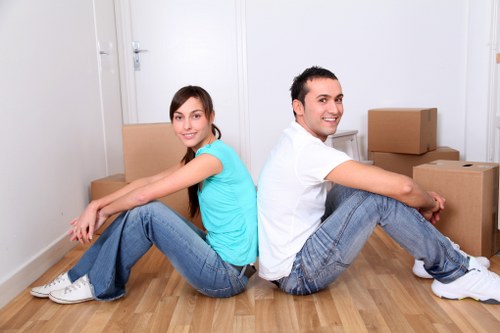 Trained mover handling furniture carefully during relocation