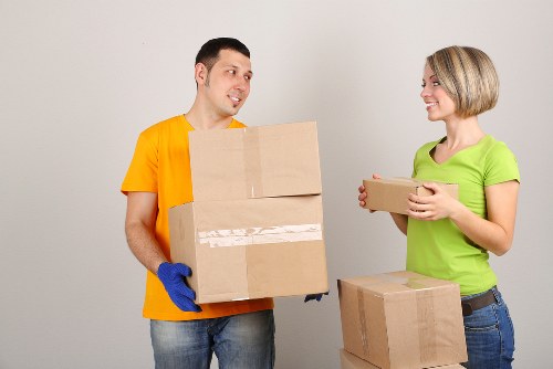 Customer and driver confirming booking details for removals
