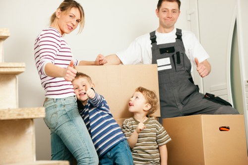 Careful loading of student belongings for transport in Dartford
